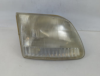 compare product 1997-2003 Ford F-150 Passenger Right Oem Head Light Headlight Lamp