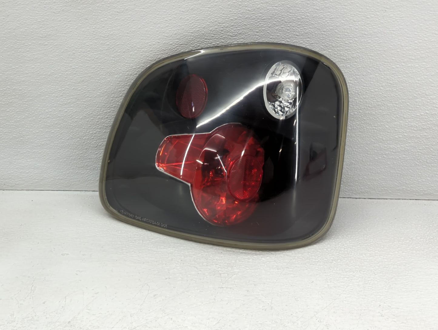 2000-2003 Ford F-150 Driver Left Side Deck Lid Mounted Tail Light - Oemusedautoparts1.com