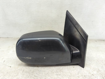 compare product 1999-2004 Honda Odyssey Passenger Side View Mirror - Right Door Mirror OEM Used