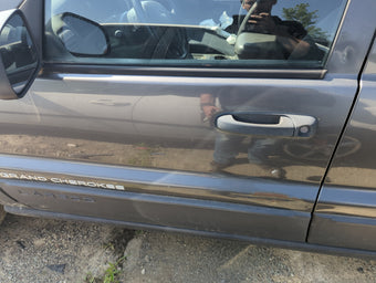 compare product 1999-2004 Jeep Grand Cherokee Driver Front Door Oem