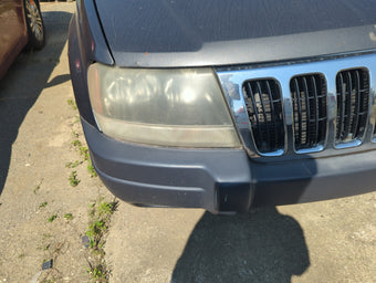 compare product 1999 Jeep Grand Cherokee Passenger Right Oem Head Light Headlight Lamp