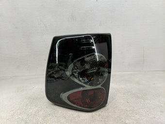 compare product 2003 Jeep Grand Cherokee Tail Light Assembly Passenger Right OEM Fits OEM Used Auto Parts