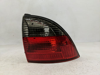 compare product 2003 Lincoln Ls Tail Light Assembly Passenger Right OEM P/N:3W43-13B504 Fits OEM Used Auto Parts