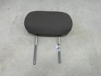 compare product 2003 Saturn L300 Headrest Head Rest Rear Center Seat Fits OEM Used Auto Parts