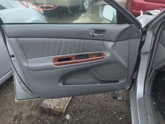 compare product 2003 Toyota Camry Front Left Driver Interior Door Panel Trim