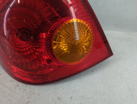 2003-2004 Toyota Corolla Tail Light Assembly Driver Left OEM P/N:2157 Fits Fits 2003 2004 OEM Used Auto Parts - Oemusedautop