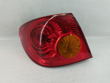 2003-2004 Toyota Corolla Tail Light Assembly Driver Left OEM Fits Fits 2003 2004 OEM Used Auto Parts - Oemusedautoparts1.com
