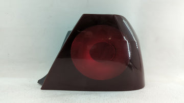 2004-2005 Chevrolet Impala Tail Light Assembly Passenger Right OEM P/N:49209454 16525262 Fits Fits 2004 2005 OEM Used Auto P