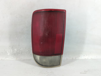 compare product 2004 Chevrolet S10 Blazer Tail Light Assembly Driver Left OEM P/N:15113579 Fits OEM Used Auto Parts