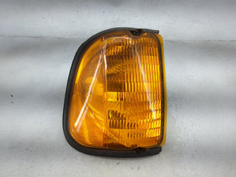 compare product Ford E150 Driver Left Oem Front Light Lamp Black
