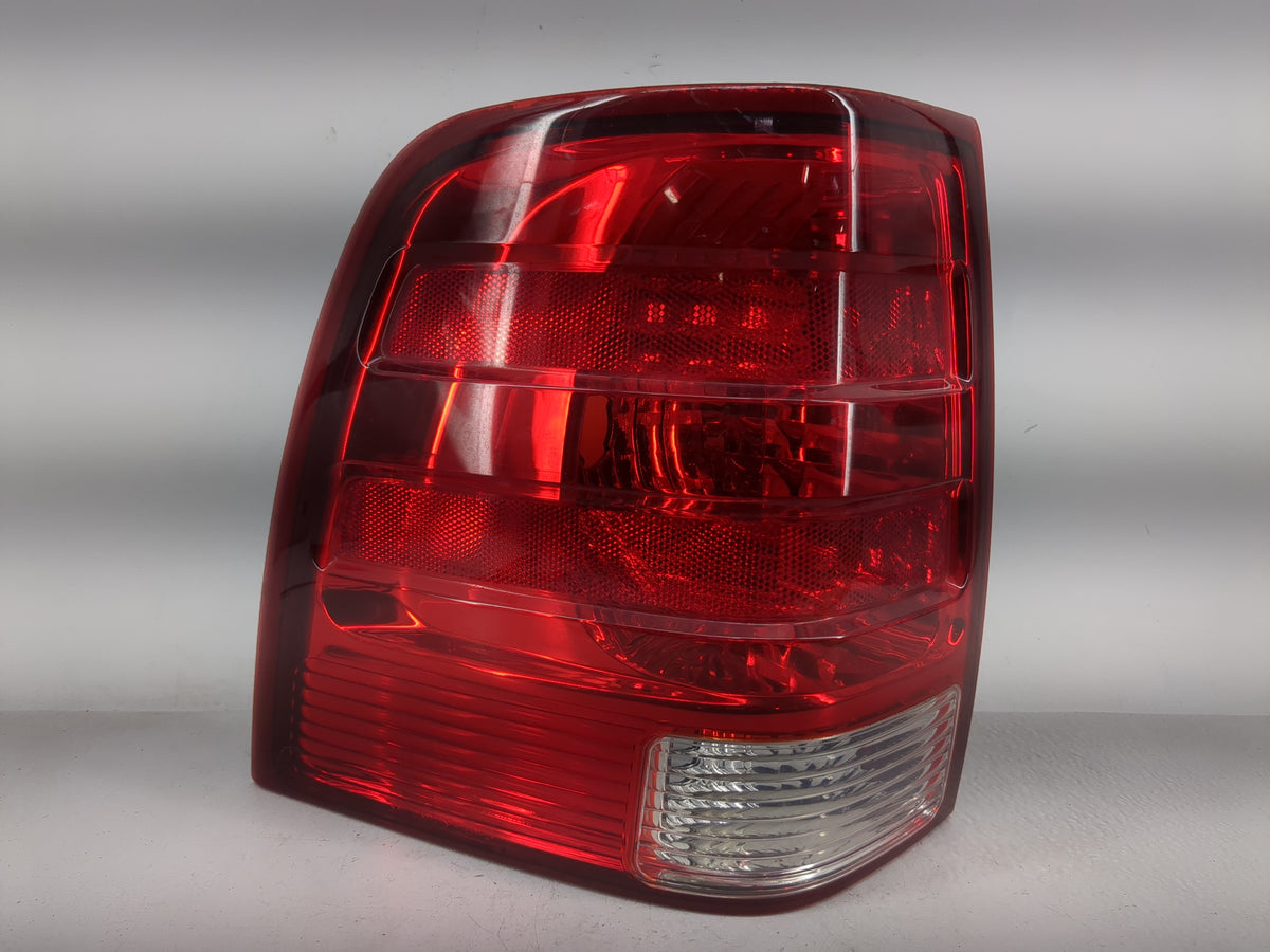 2003-2006 Ford Expedition Tail Light Assembly Driver Left OEM P/N:2L1X-13B504-A Fits Fits 2003 2004 2005 2006 OEM Used Auto 