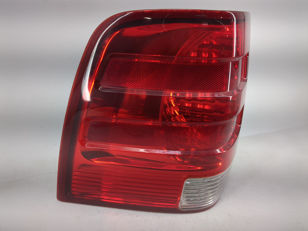 2003-2006 Ford Expedition Tail Light Assembly Driver Left OEM P/N:2L1X-13B504-A Fits Fits 2003 2004 2005 2006 OEM Used Auto 