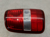 2001-2004 Ford F-150 Tail Light Assembly Driver Left OEM P/N:4L34-13B505-A Fits Fits 2001 2002 2003 2004 OEM Used Auto Parts