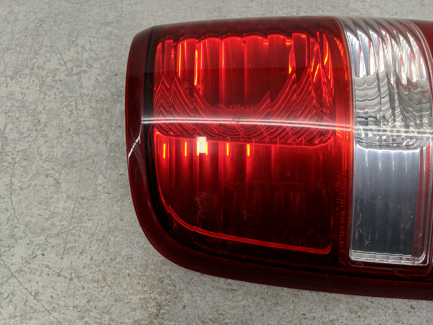 2001-2004 Ford F-150 Tail Light Assembly Driver Left OEM P/N:4L34-13B505-A Fits Fits 2001 2002 2003 2004 OEM Used Auto Parts
