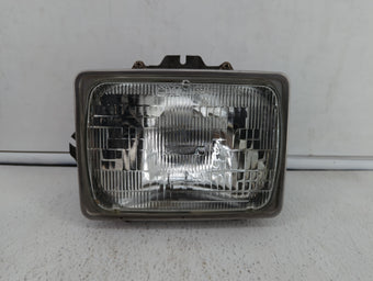 compare product Ford F-250 Passenger Right Oem Head Light Headlight Lamp
