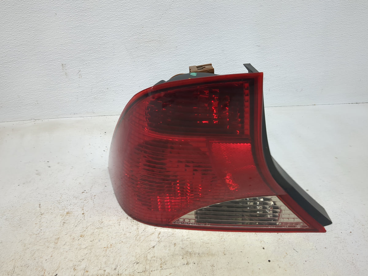 2004 Ford Focus Tail Light Assembly Driver Left OEM P/N:1S4X-13405-BA Fits OEM Used Auto Parts - Oemusedautoparts1.com
