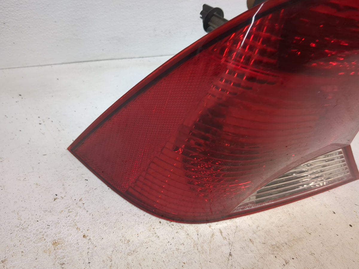 2004 Ford Focus Tail Light Assembly Driver Left OEM P/N:1S4X-13405-BA Fits OEM Used Auto Parts - Oemusedautoparts1.com