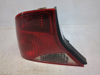 2004 Ford Focus Tail Light Assembly Driver Left OEM P/N:1S4X-13405-BA Fits OEM Used Auto Parts - Oemusedautoparts1.com