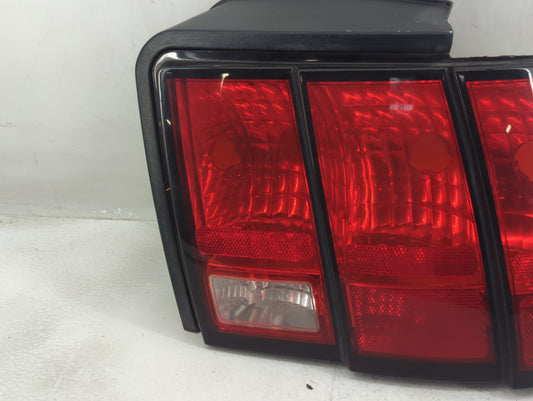1999-2004 Ford Mustang Tail Light Assembly Passenger Right OEM P/N:XR33-13B504 Fits Fits 1999 2000 2001 2002 2003 2004 OEM Used Auto Parts