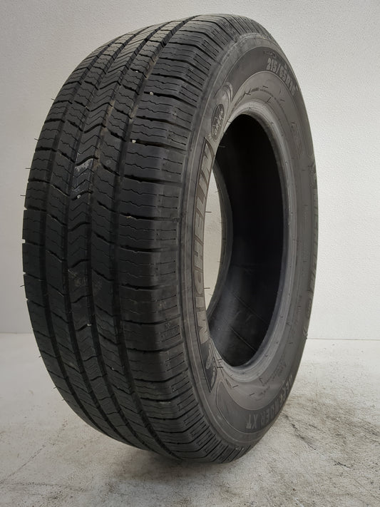 Used Tire 215/65R16 MICHELIN DEFENDER XT 98T - Tread Depth 8.5/32 - Oemusedautoparts1.com