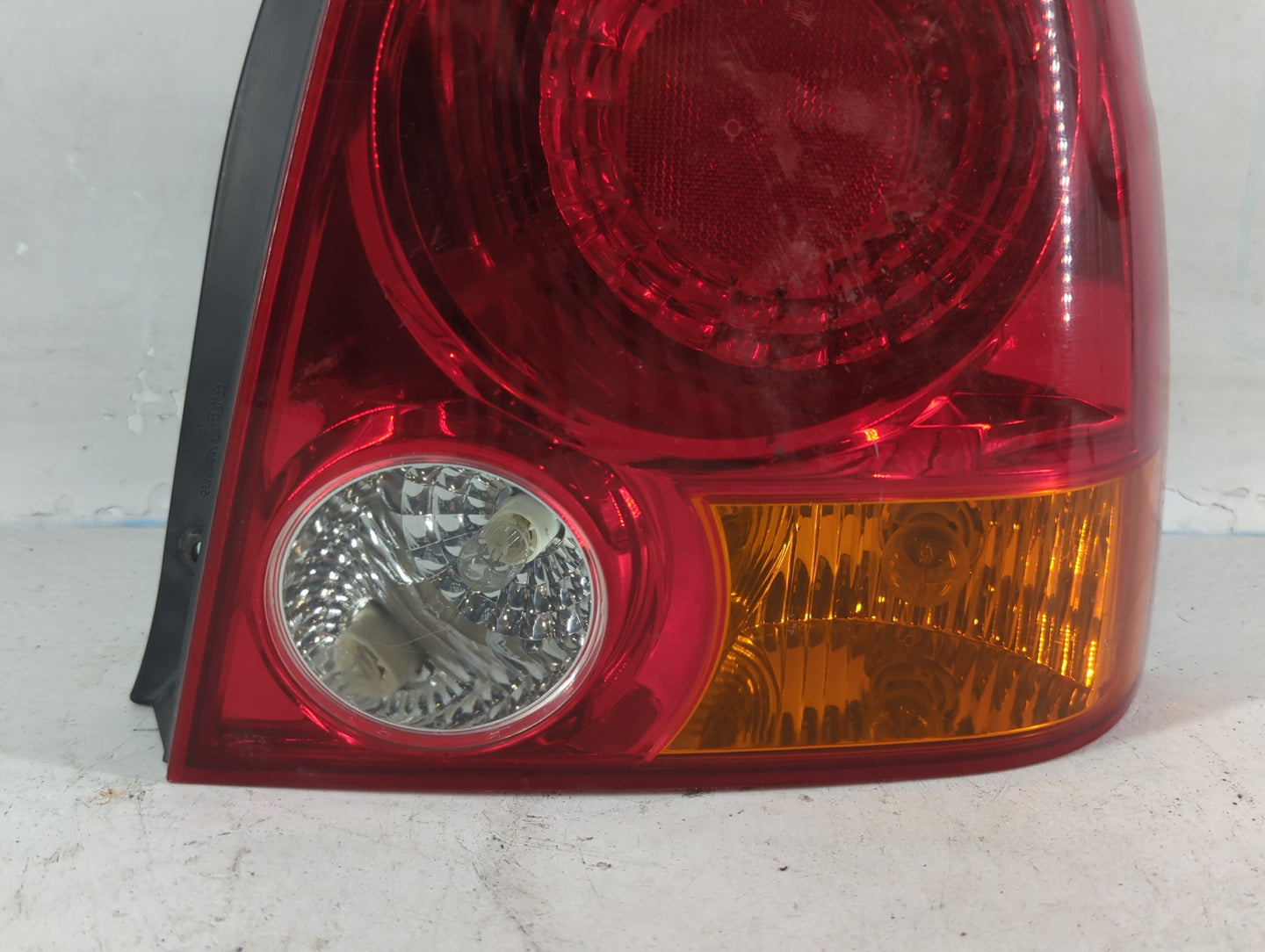 2004-2006 Hyundai Accent Tail Light Assembly Driver Left OEM P/N:92402-255XX Fits Fits 2004 2005 2006 OEM Used Auto Parts - 