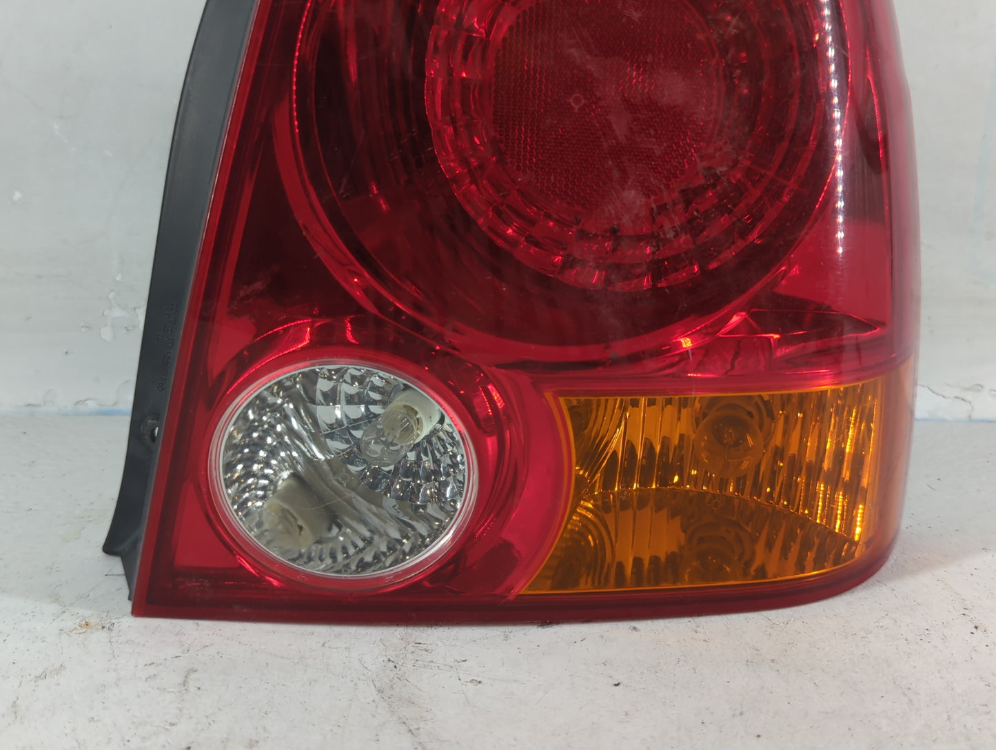 2004-2006 Hyundai Accent Tail Light Assembly Driver Left OEM P/N:92402-255XX Fits Fits 2004 2005 2006 OEM Used Auto Parts - 