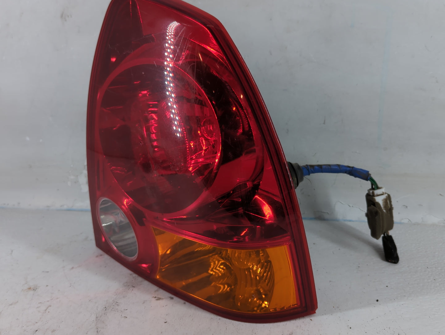 2004-2006 Hyundai Accent Tail Light Assembly Driver Left OEM P/N:92402-255XX Fits Fits 2004 2005 2006 OEM Used Auto Parts - 