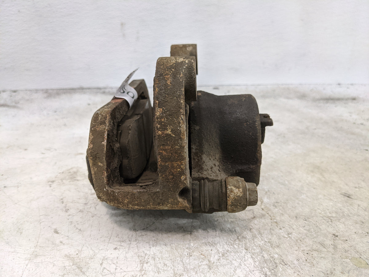 2003-2005 Infiniti G35 Front Driver Left Brake Caliper - Oemusedautoparts1.com