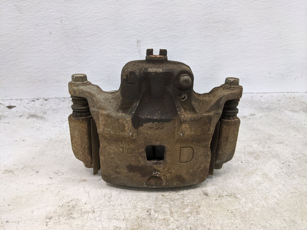2003-2005 Infiniti G35 Front Driver Left Brake Caliper - Oemusedautoparts1.com