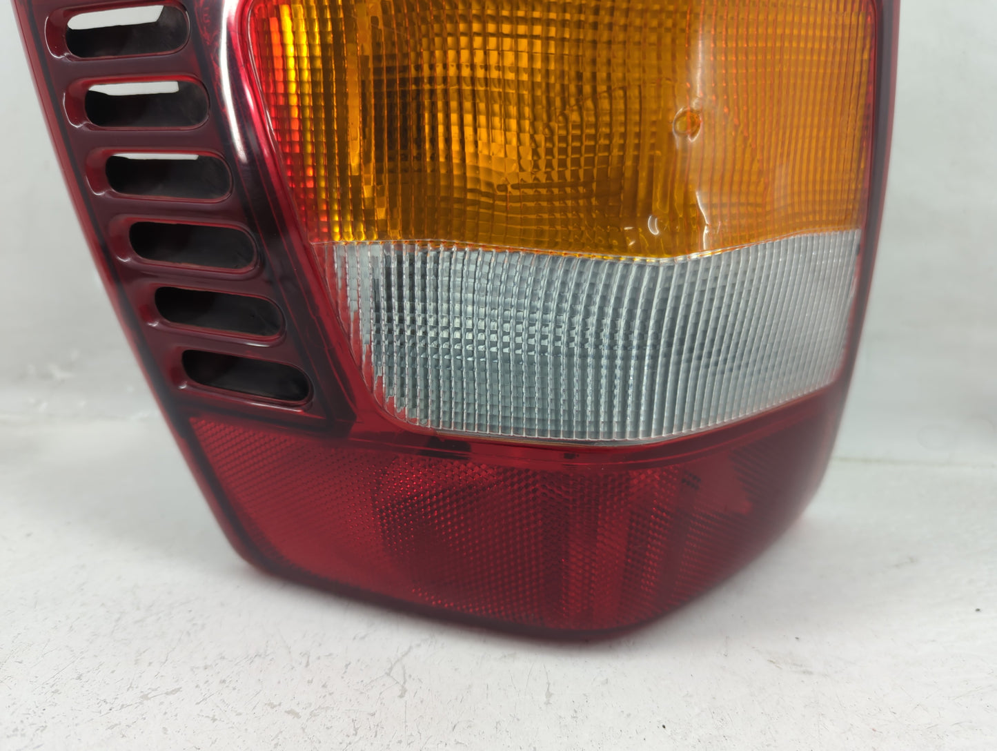 2003-2004 Jeep Grand Cherokee Tail Light Assembly Driver Left OEM P/N:3911-02A Fits Fits 2003 2004 OEM Used Auto Parts - Oem