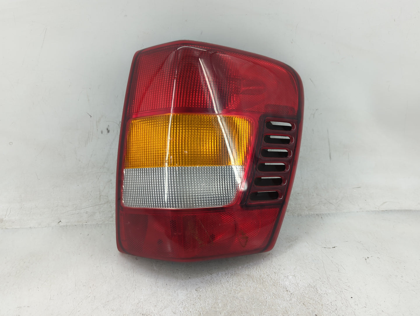 2003-2004 Jeep Grand Cherokee Tail Light Assembly Passenger Right OEM P/N:3911-02A Fits Fits 2003 2004 OEM Used Auto Parts -