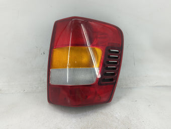 compare product 2003-2004 Jeep Grand Cherokee Tail Light Assembly Passenger Right OEM P/N:3911-02A Fits Fits 2003 2004 OEM Used Auto Parts