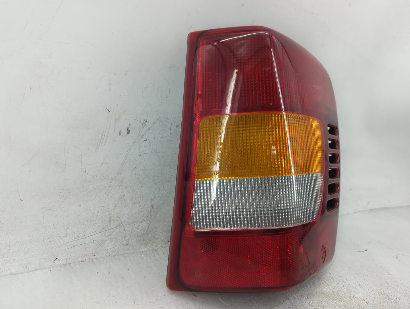2003-2004 Jeep Grand Cherokee Tail Light Assembly Passenger Right OEM P/N:3911-02A Fits Fits 2003 2004 OEM Used Auto Parts -