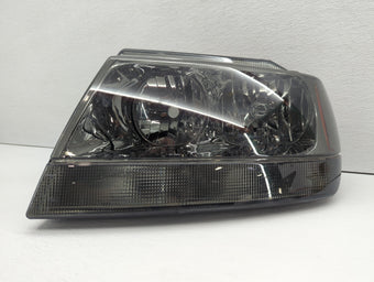 compare product 2002-2004 Jeep Grand Cherokee Driver Left Oem Head Light Headlight Lamp