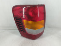 2003-2004 Jeep Grand Cherokee Tail Light Assembly Driver Left OEM Fits Fits 2003 2004 OEM Used Auto Parts - Oemusedautoparts