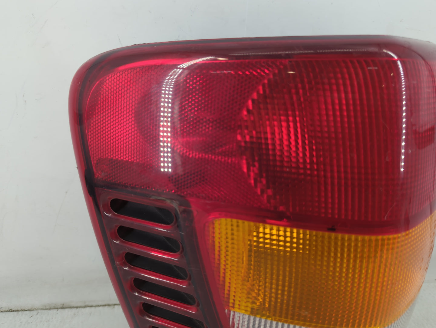 2003-2004 Jeep Grand Cherokee Tail Light Assembly Driver Left OEM Fits Fits 2003 2004 OEM Used Auto Parts - Oemusedautoparts