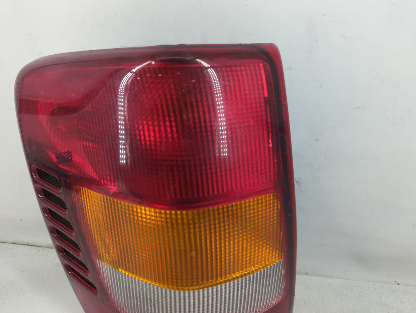 2003-2004 Jeep Grand Cherokee Tail Light Assembly Driver Left OEM Fits Fits 2003 2004 OEM Used Auto Parts - Oemusedautoparts