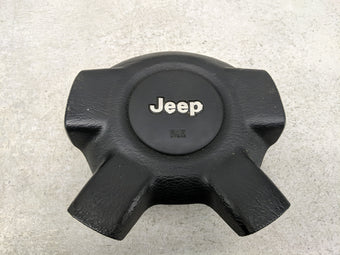 compare product 2004 Jeep Liberty Air Bag Driver Left Steering Wheel Mounted P/N:5JS061X9AC Fits OEM Used Auto Parts