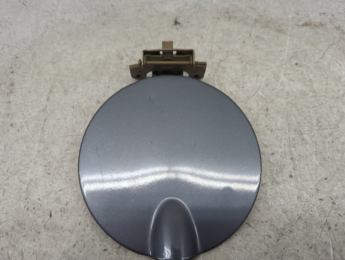 2004 Mitsubishi Endeavor Fuel Tank Door Lid Gas Tank Gray - Oemusedautoparts1.com