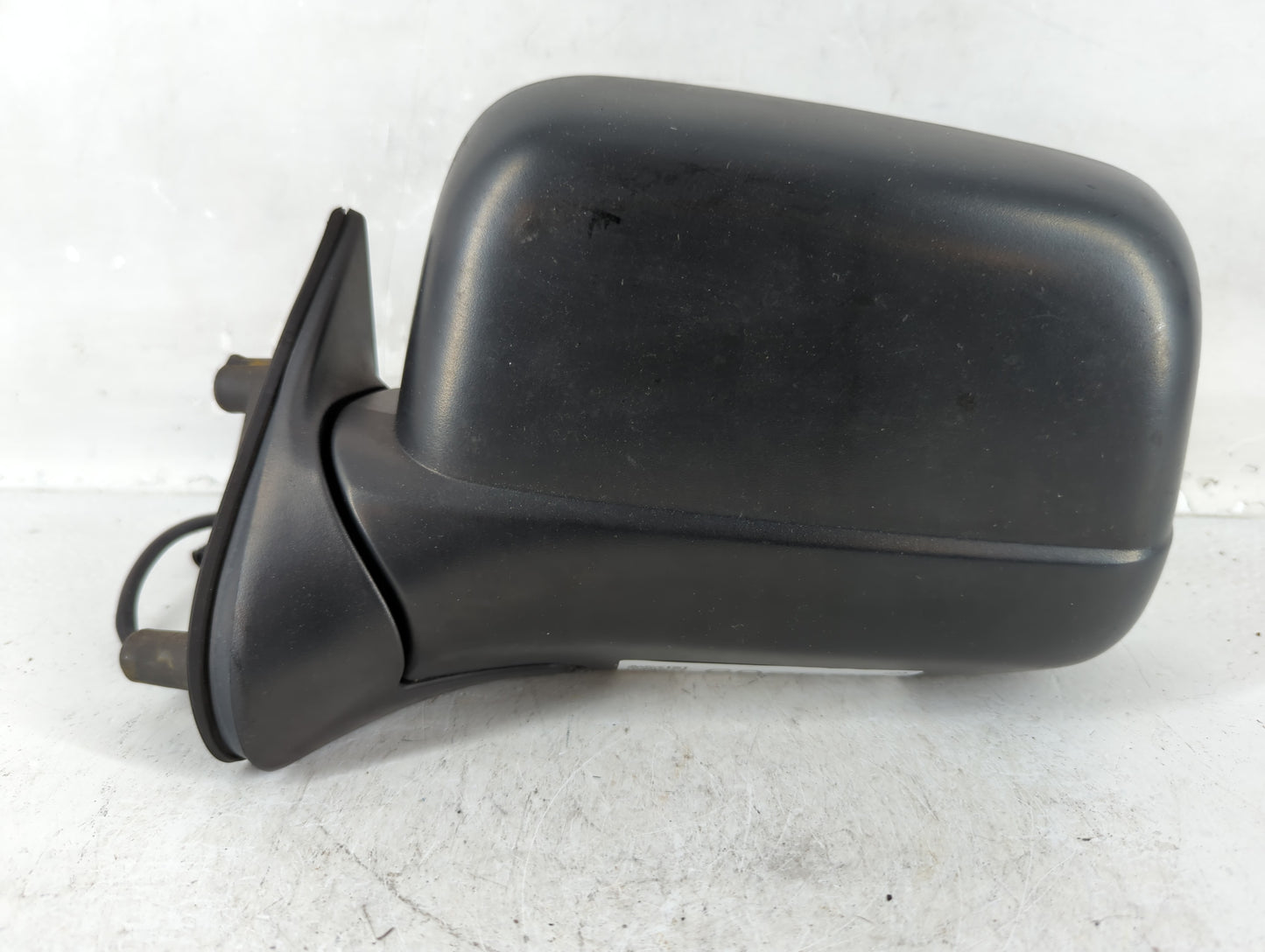 2000-2004 Nissan Frontier Driver Left Side View Manual Door Mirror Black - Oemusedautoparts1.com