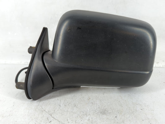 2000-2004 Nissan Frontier Driver Left Side View Manual Door Mirror Black - Oemusedautoparts1.com