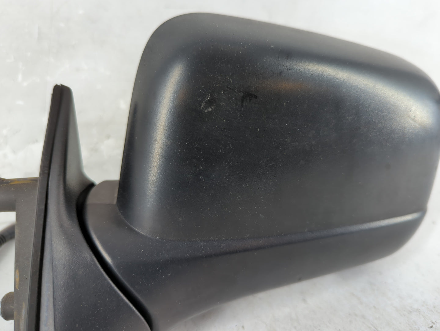 2000-2004 Nissan Frontier Driver Left Side View Manual Door Mirror Black - Oemusedautoparts1.com