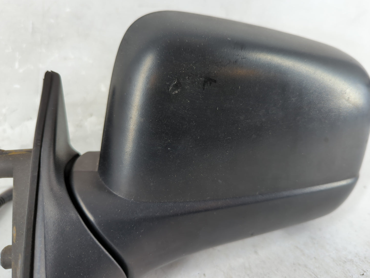 2000-2004 Nissan Frontier Driver Left Side View Manual Door Mirror Black - Oemusedautoparts1.com