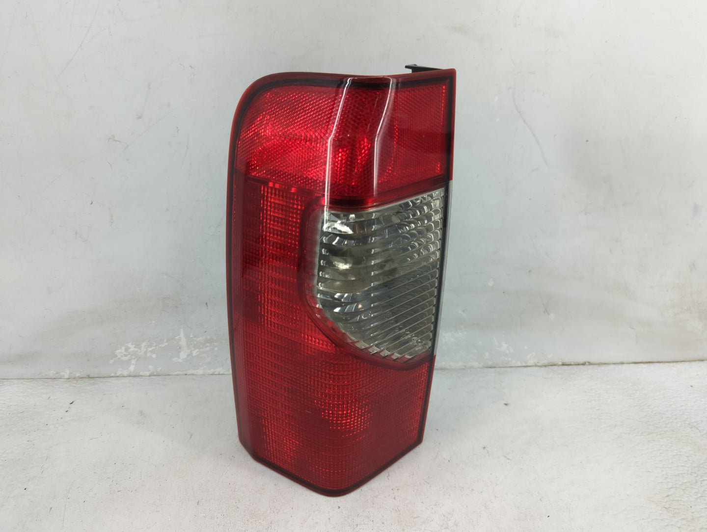 2002-2004 Nissan Xterra Tail Light Assembly Driver Left OEM P/N:935 700-03 Fits Fits 2002 2003 2004 OEM Used Auto Parts - Oe
