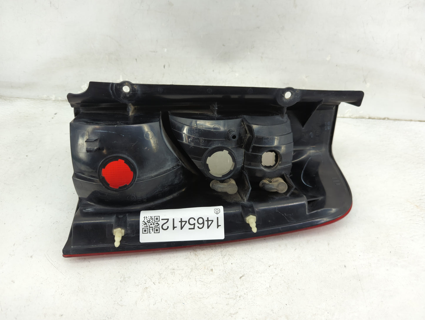 2002-2004 Nissan Xterra Tail Light Assembly Driver Left OEM P/N:935 700-03 Fits Fits 2002 2003 2004 OEM Used Auto Parts - Oe