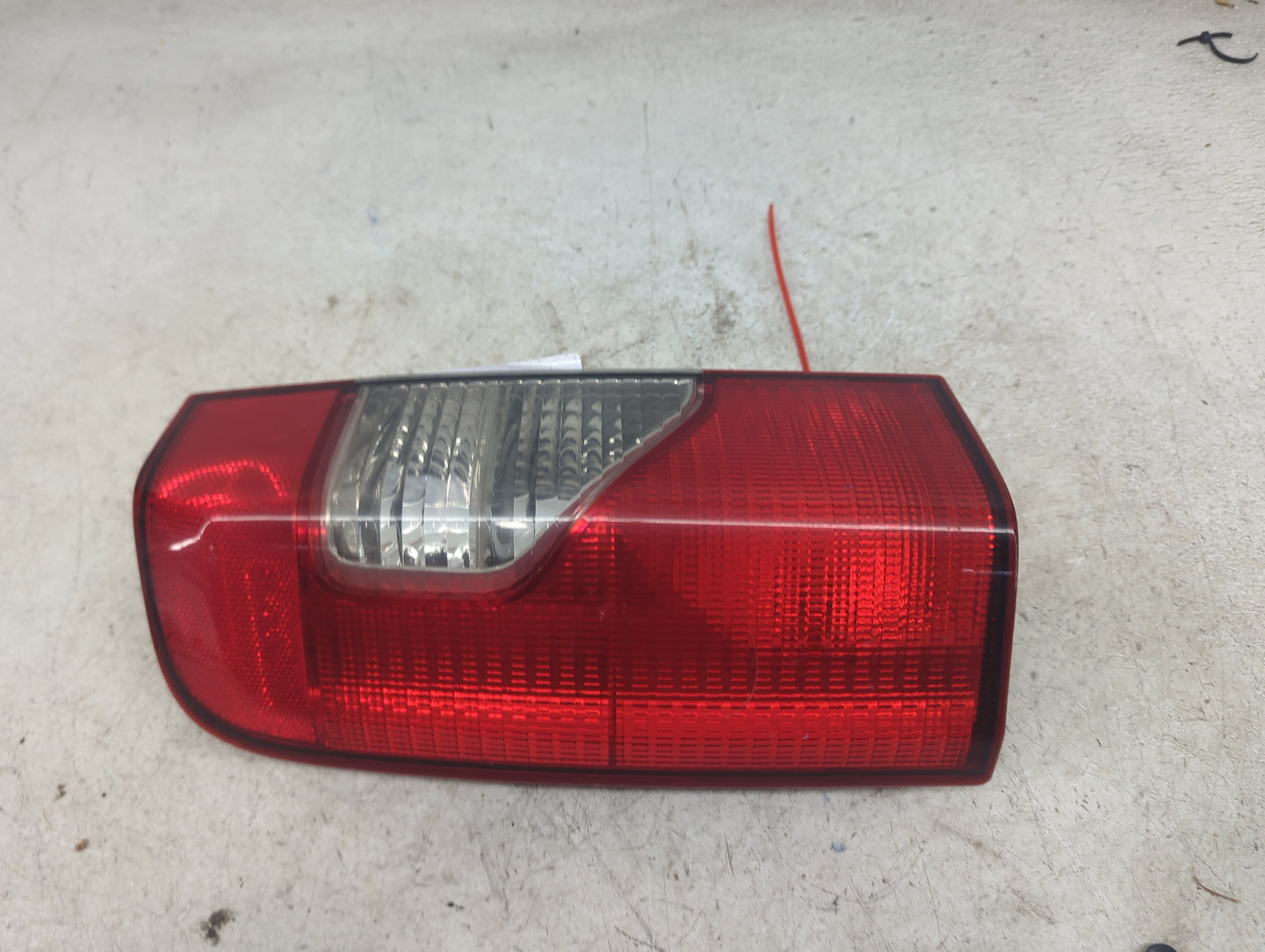 2002-2004 Nissan Xterra Tail Light Assembly Driver Left OEM P/N:935 700 355 Fits Fits 2002 2003 2004 OEM Used Auto Parts - O