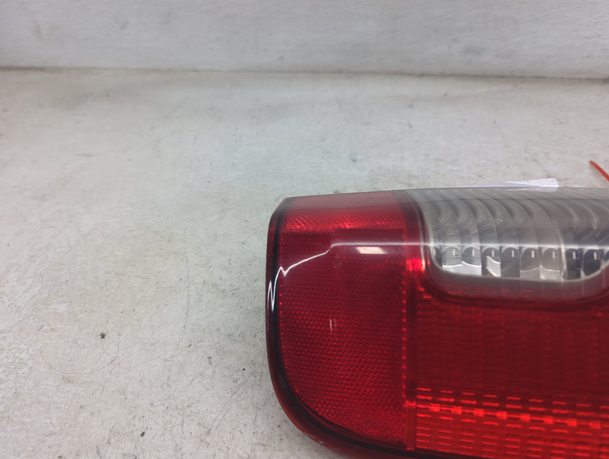 2002-2004 Nissan Xterra Tail Light Assembly Driver Left OEM P/N:935 700 355 Fits Fits 2002 2003 2004 OEM Used Auto Parts - O