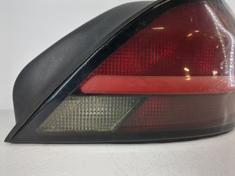 compare product 1999 Grand Am Passenger Right Side Tail Light Taillight Deck Lid Mounted