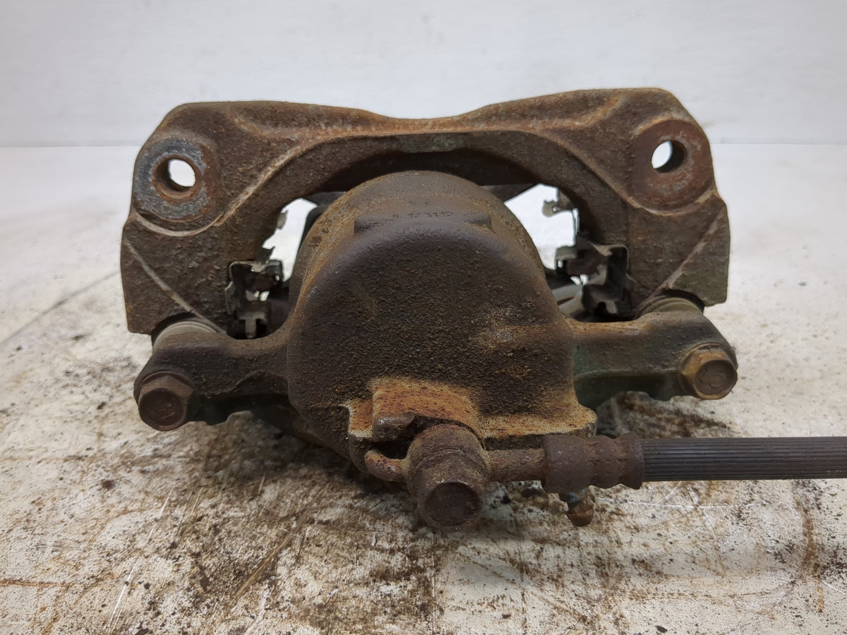 2002-2006 Toyota Camry Front Driver Left Brake Caliper 1519012 - Oemusedautoparts1.com