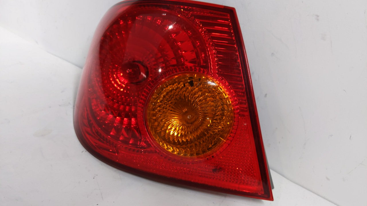 2003-2004 Toyota Corolla Tail Light Assembly Driver Left OEM Fits Fits 2003 2004 OEM Used Auto Parts - Oemusedautoparts1.com